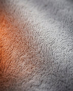 06_macro_plush_exterior.png