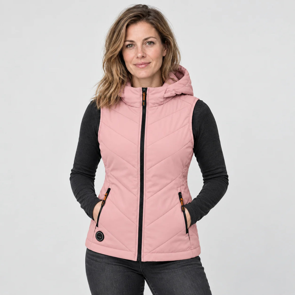 Gilet riscaldato da donna con cappuccio PyreFit Transitor in rosa, vista frontale