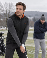 Gilet sportivo riscaldato da uomo PyreFit Ventaro in inverno: sul campo da golf
